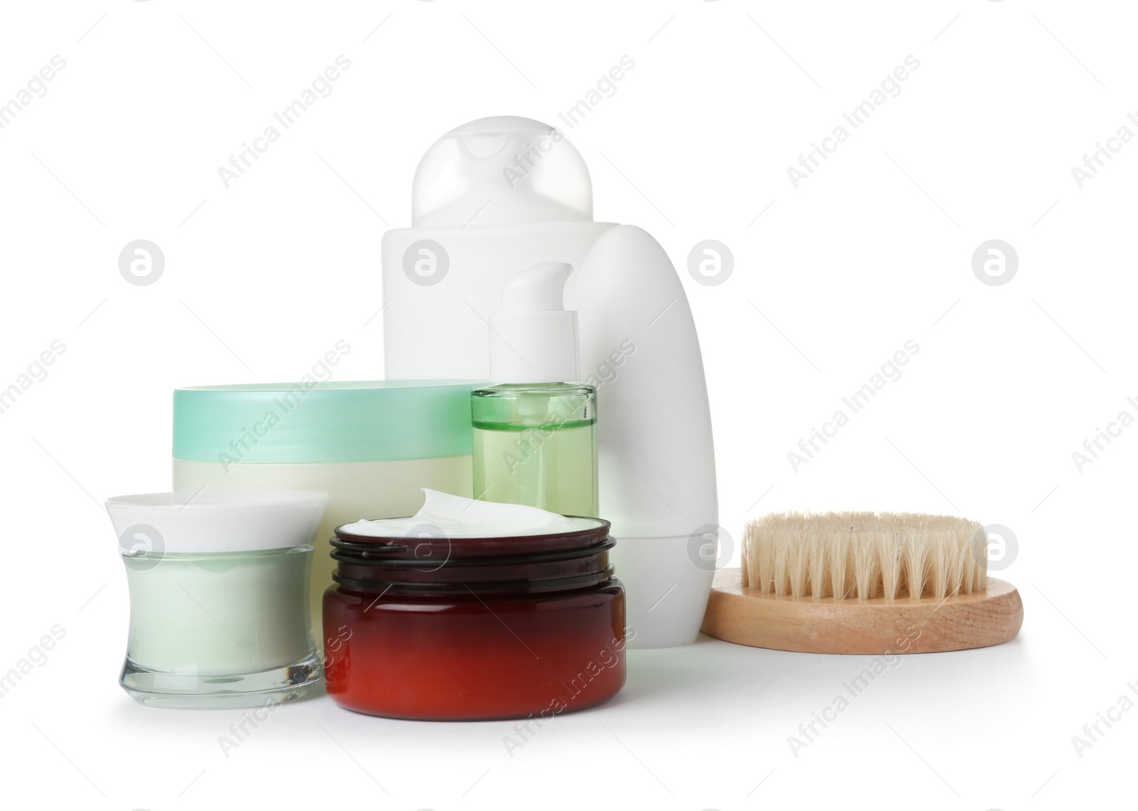 Photo of Different body care products and brush on white background