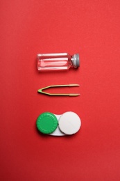 Photo of Flat lay composition with contact lens accessories on color background