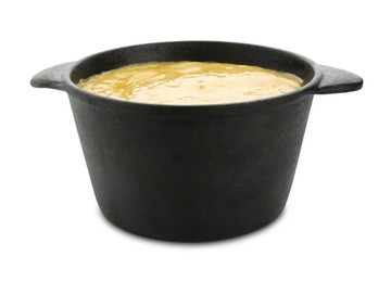 Photo of Fondue pot with tasty melted cheese isolated on white