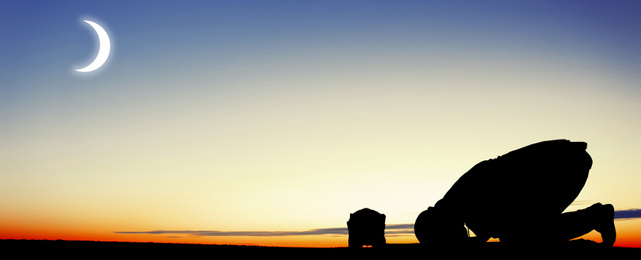Image of Silhouette of Muslim man praying at sunset, banner design. Holy month of Ramadan