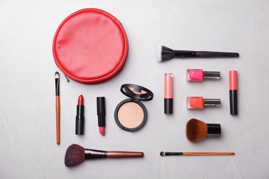 Flat lay composition with cosmetic products on grey background