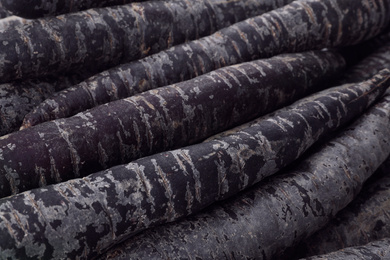 Photo of Fresh raw black carrots as background, closeup