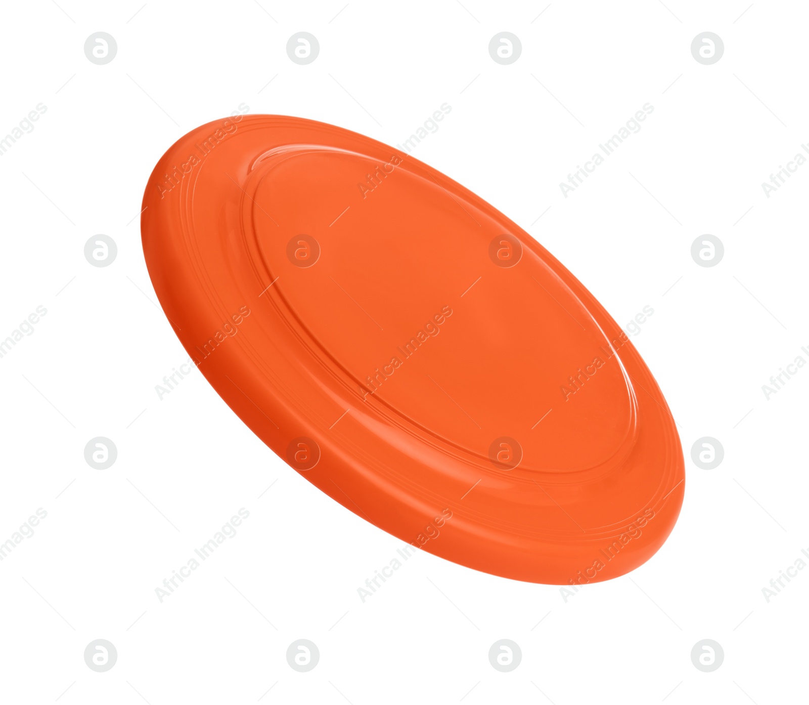 Photo of Orange plastic frisbee disk isolated on white