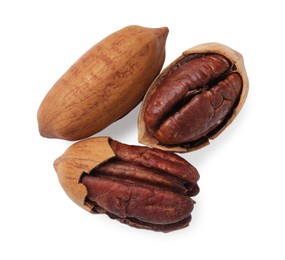 Photo of Tasty pecan nuts isolated on white, top view