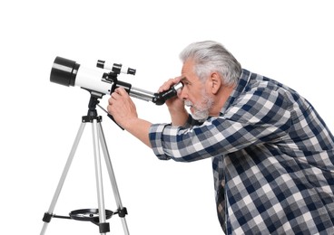 Photo of Senior astronomer looking at stars through telescope on white background