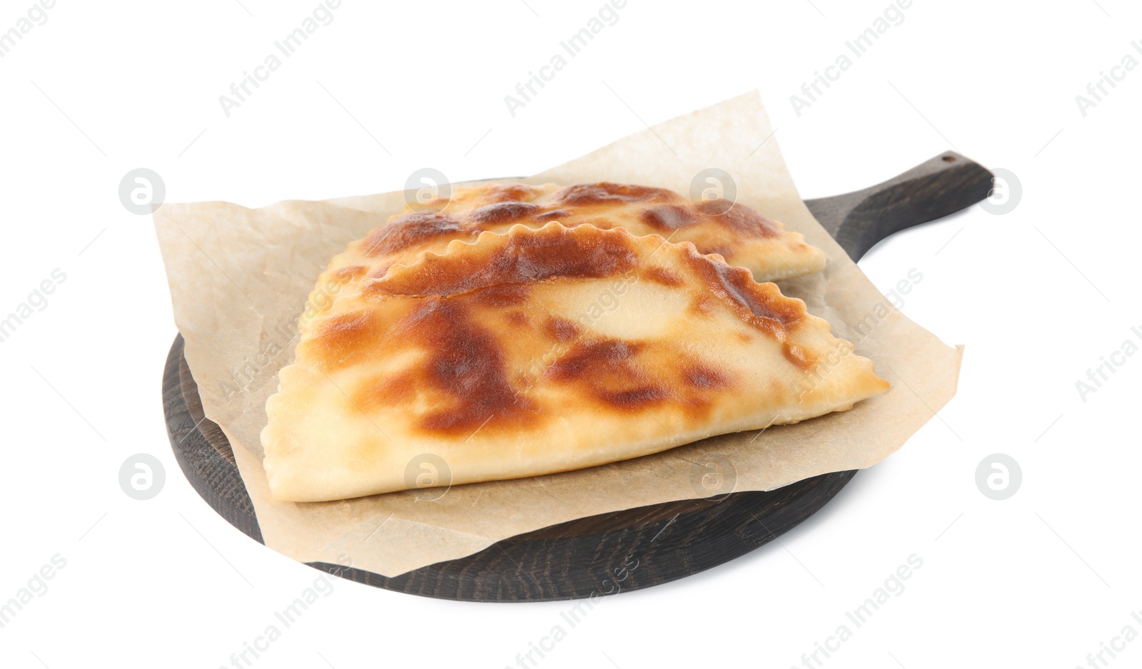 Photo of Board with delicious fried chebureki isolated on white