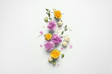 Photo of Flat lay composition with beautiful blooming flowers on white background