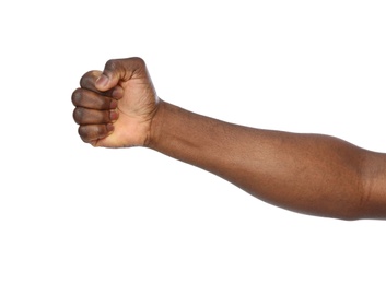 Photo of African-American man showing fist on white background, closeup