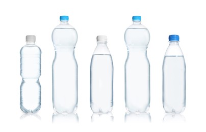 Image of Set with different bottles of pure water on white background 