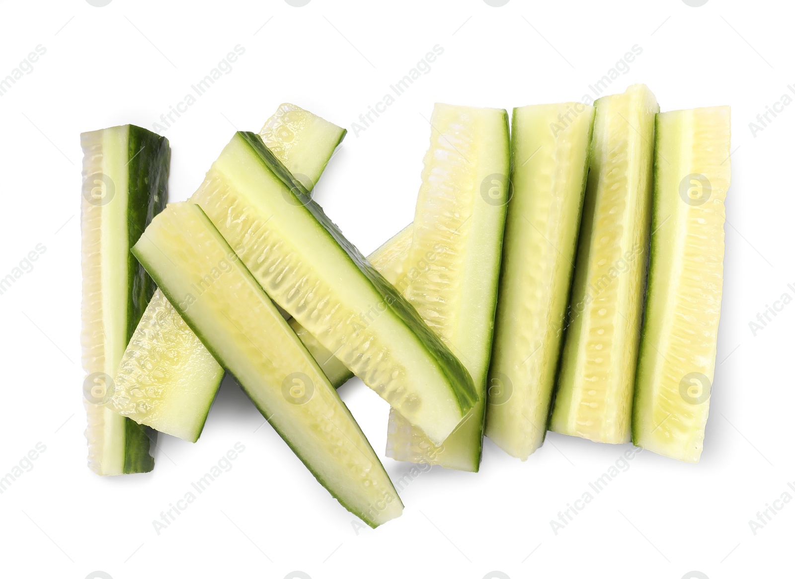 Photo of Pieces of fresh cucumber isolated on white, top view