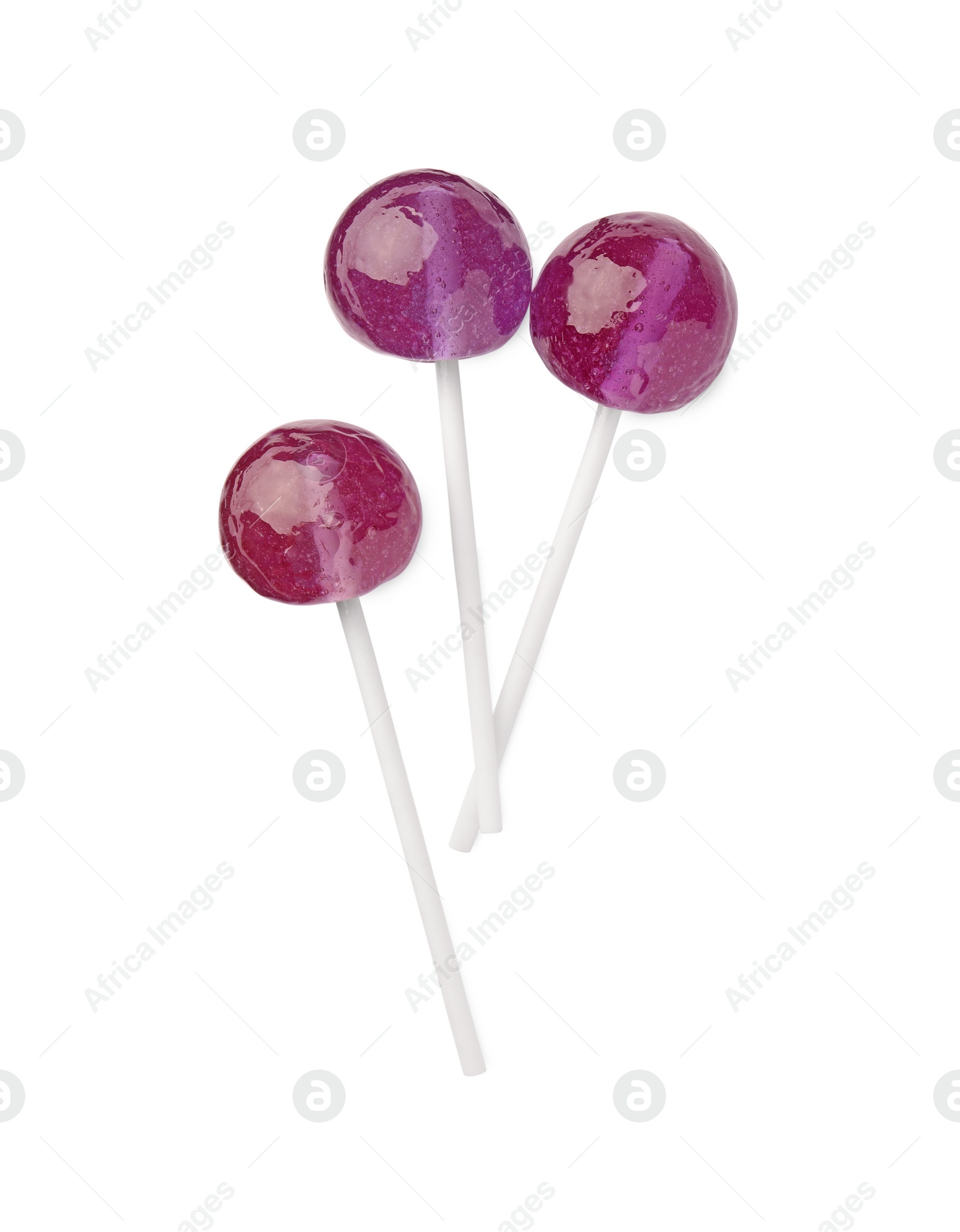 Photo of Many sweet purple lollipops isolated on white, top view