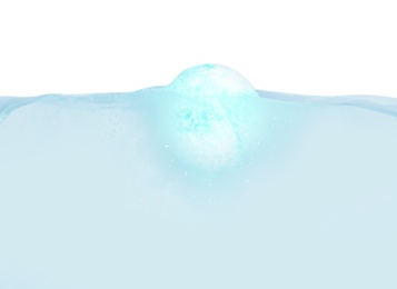 Photo of Bath bomb in water on white background