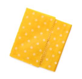 Photo of Yellow reusable beeswax food wrap on white background, top view