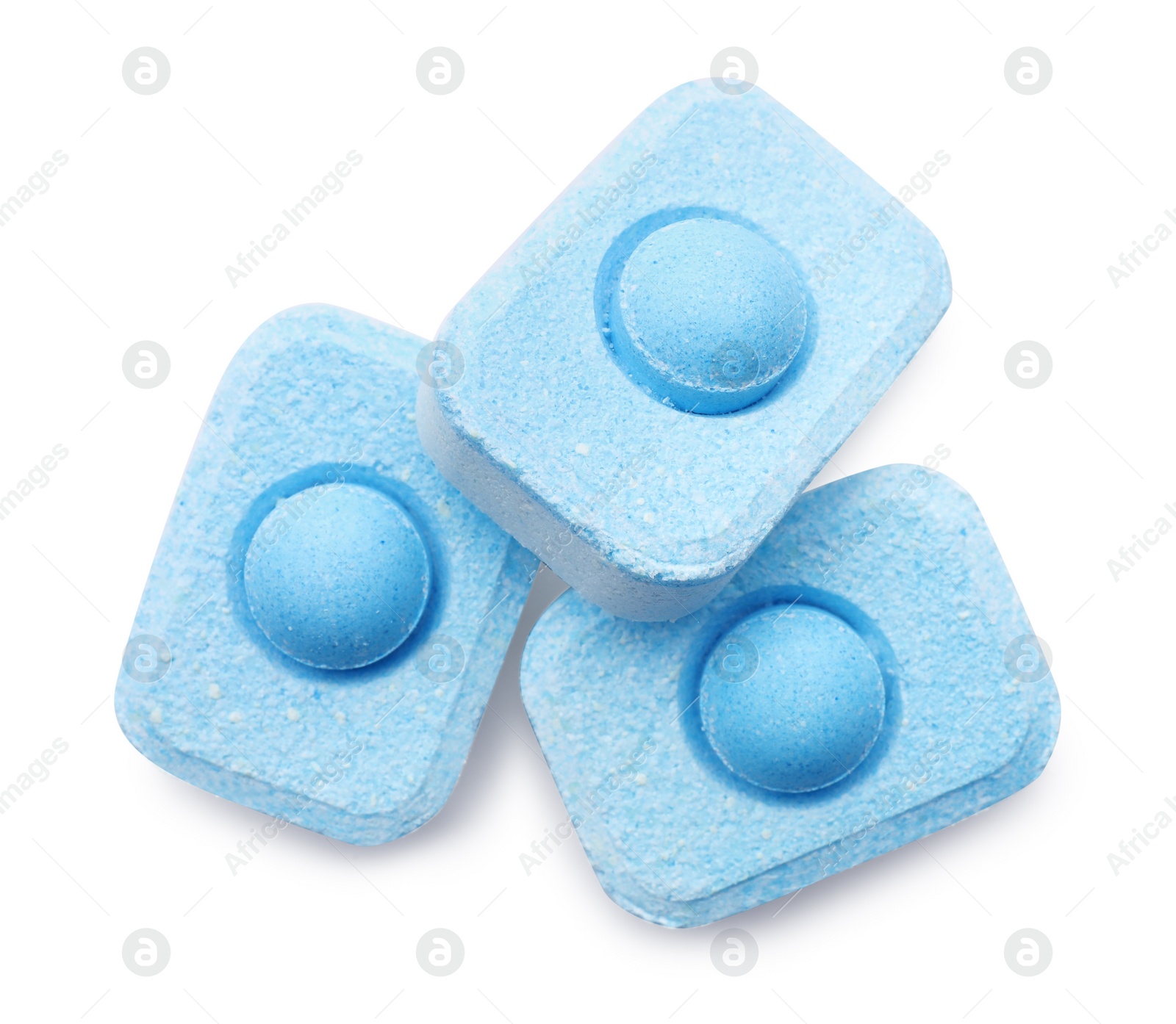 Photo of Water softener tablets on white background, top view