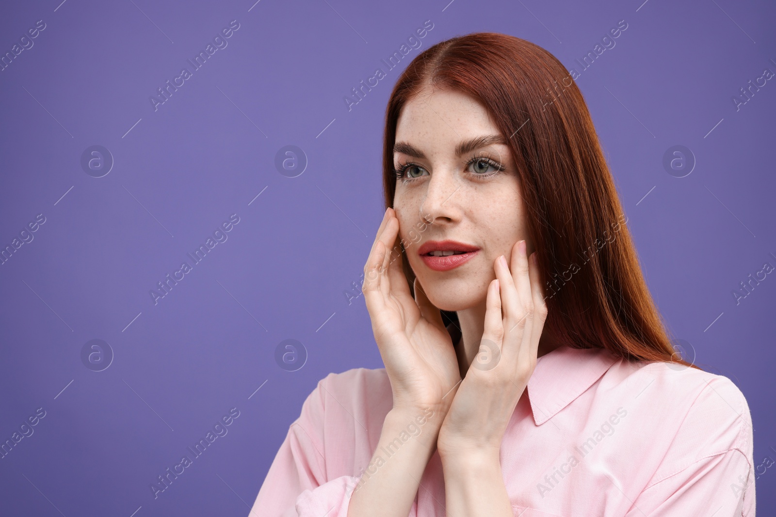 Photo of Portrait of beautiful woman on purple background. Space for text