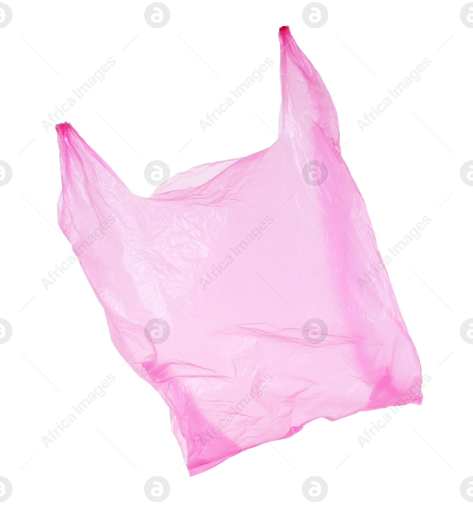 Photo of One pink plastic bag isolated on white