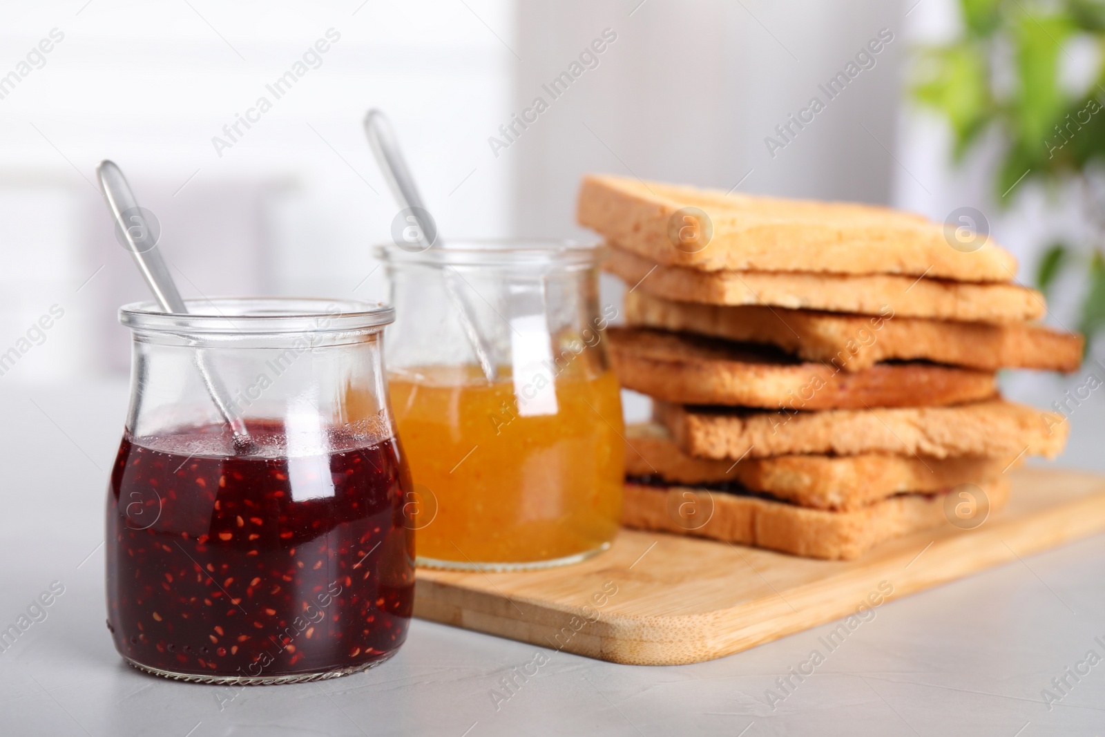 Image of Toasts and jams for breakfast on table