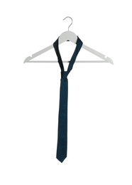 Photo of Hanger with blue necktie isolated on white