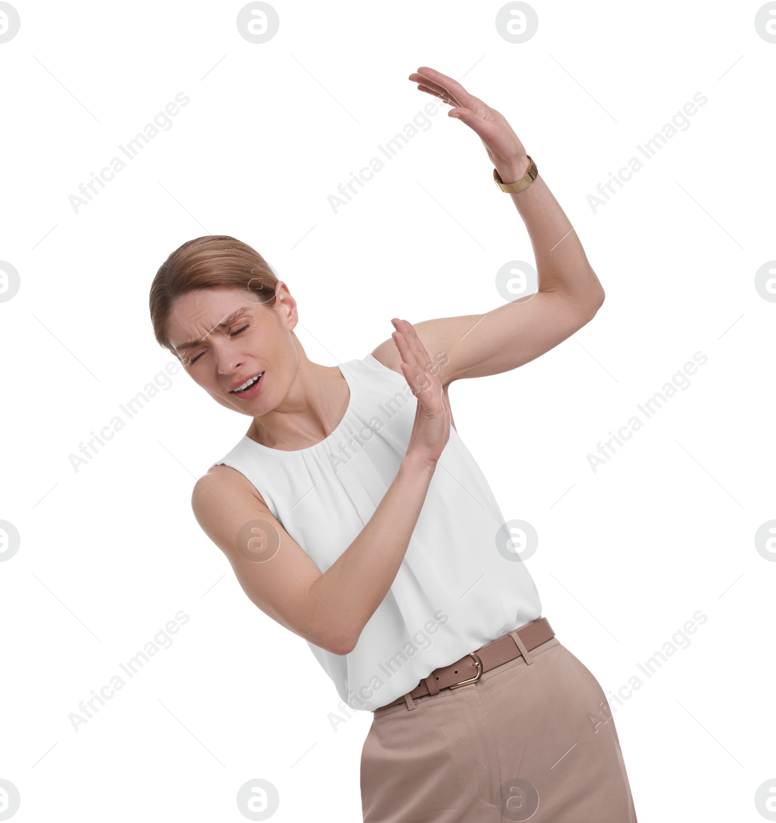Photo of Beautiful businesswoman avoiding something on white background