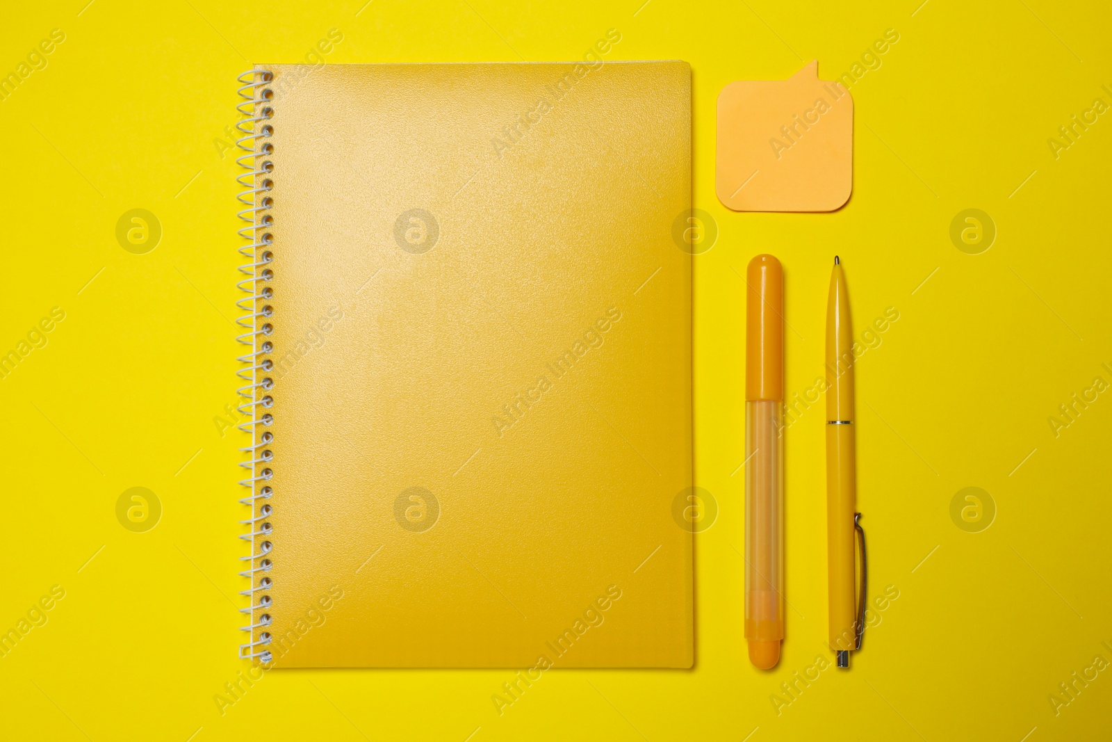 Photo of Different school stationery on yellow background, flat lay