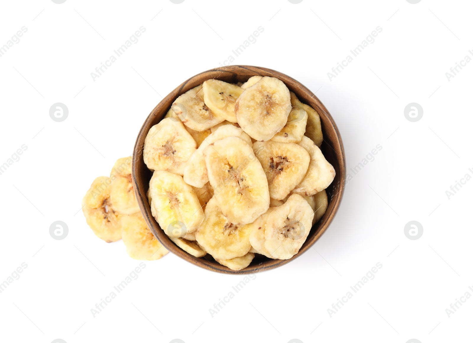 Photo of Wooden bowl with sweet banana slices on white background, top view. Dried fruit as healthy snack