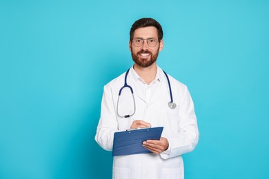 Photo of Doctor with stethoscope and clipboard on light blue background