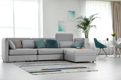 Photo of Modern living room interior with comfortable sofa