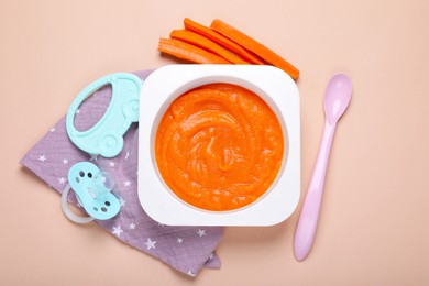 Photo of Flat lay composition with healthy baby food on beige background