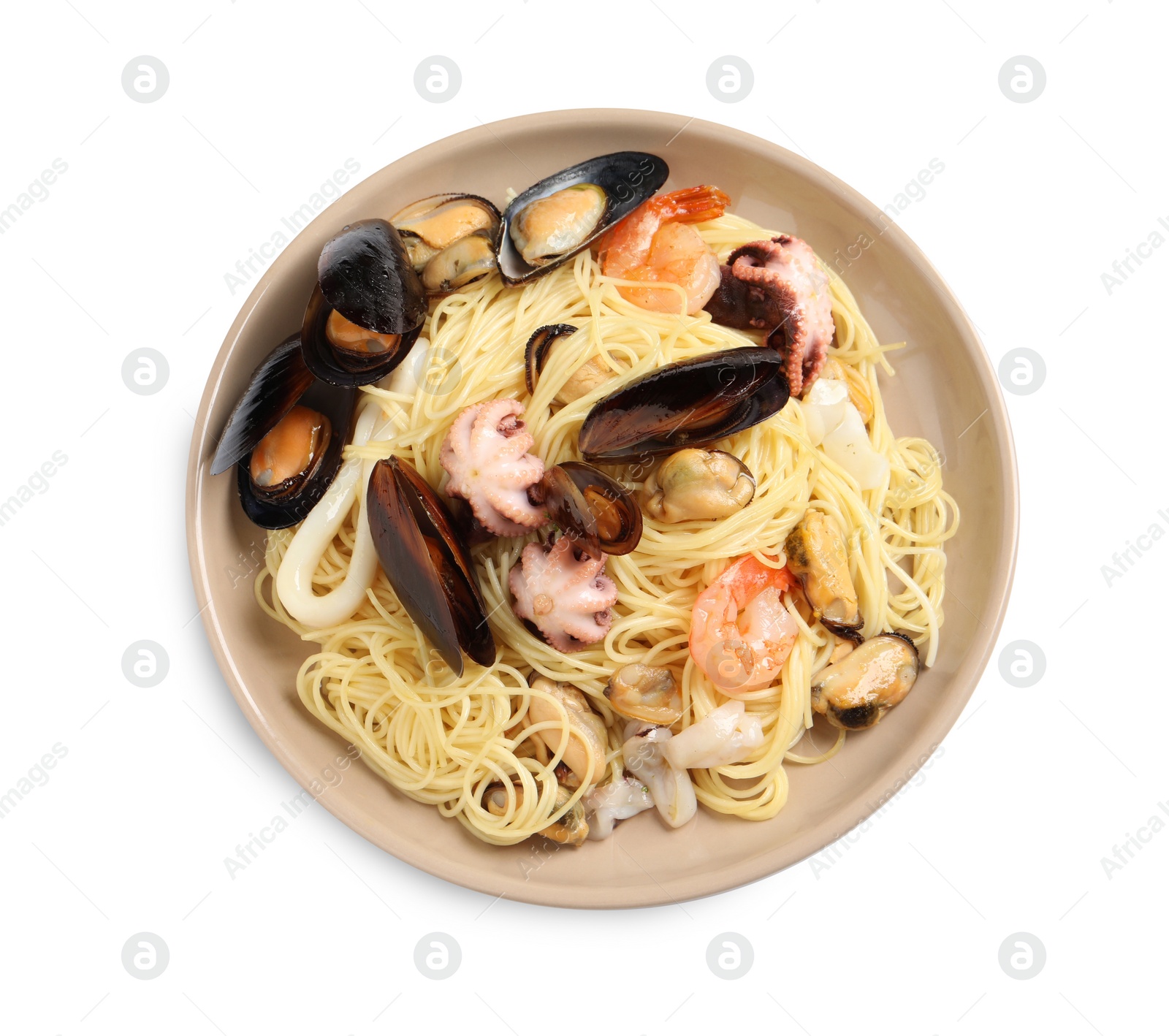Photo of Delicious pasta with sea food in plate isolated on white, top view