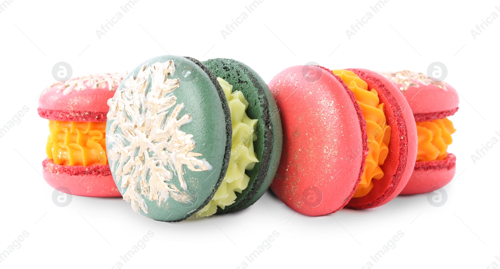 Photo of Beautifully decorated Christmas macarons isolated on white