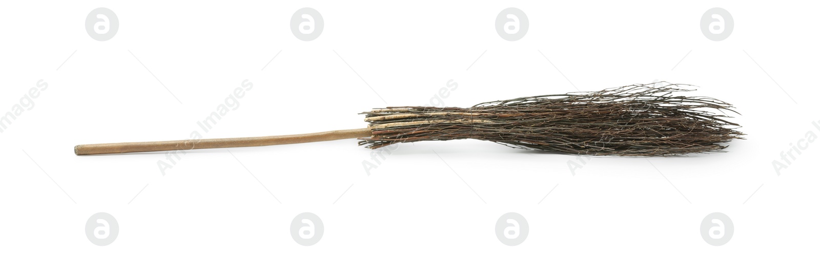 Photo of Old broom with wooden handle isolated on white