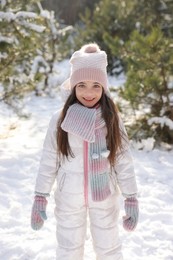 Cute little girl outdoors on winter day. Christmas vacation