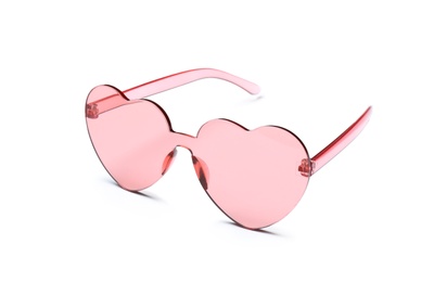 Photo of Stylish heart shaped glasses on white background