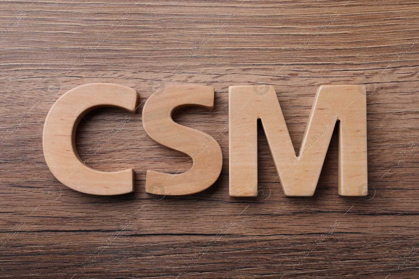 Photo of Abbreviation CSM (Customer Service Management) made of letters on wooden background, flat lay