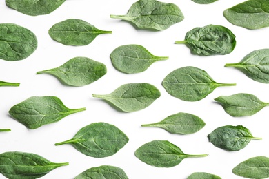 Fresh green healthy spinach leaves on white background, top view