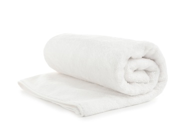 Photo of Rolled soft terry towel on white background