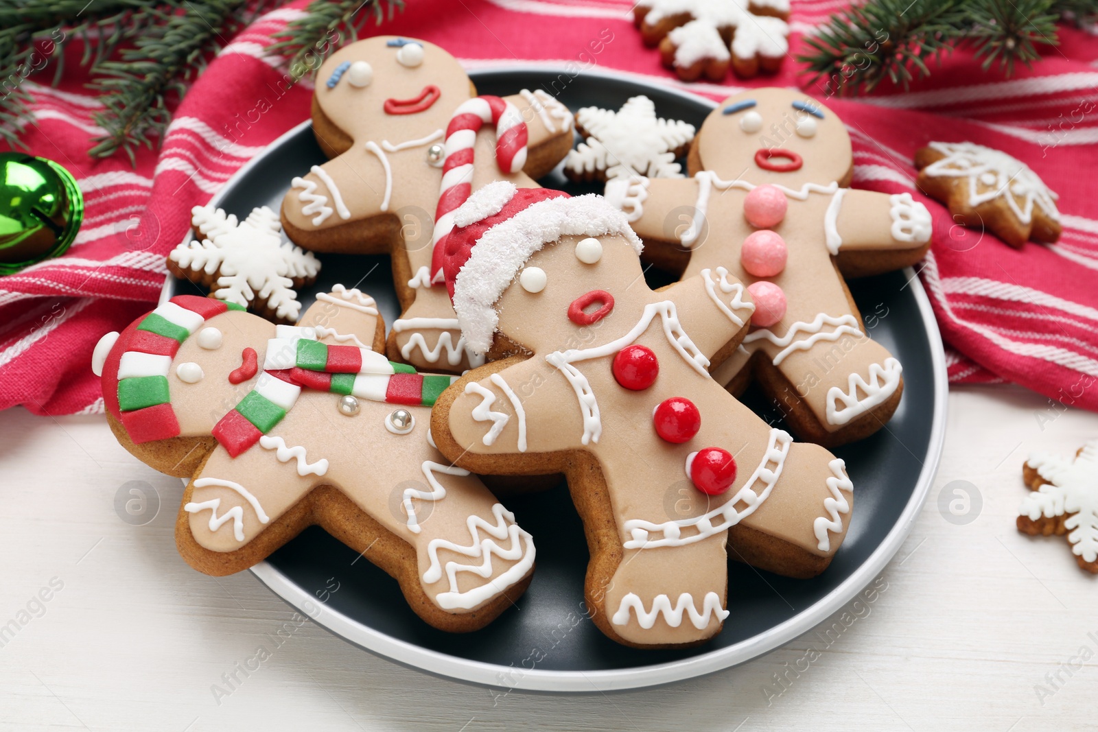 Photo of Delicious Christmas cookies on white wooden table, closeup