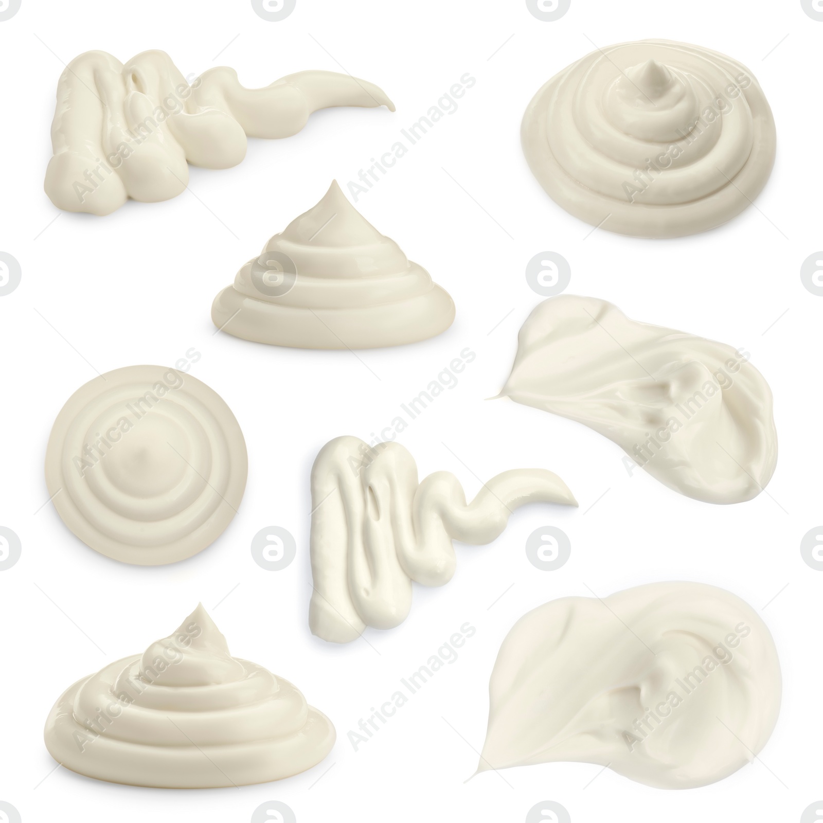 Image of Sour cream or mayonnaise smears isolated on white, set. Delicious sauce