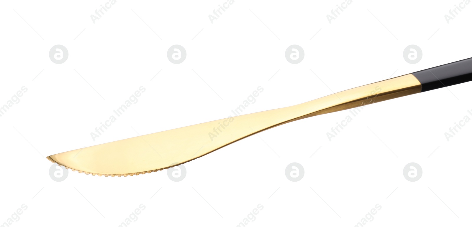 Photo of One golden knife isolated on white. Piece of cutlery