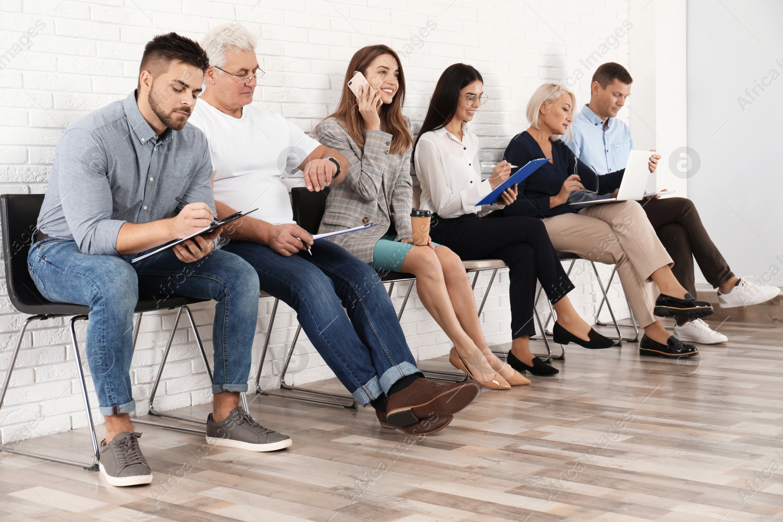 Photo of People waiting for job interview in office