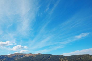 Photo of Picturesque view of sky with clouds over mountains
