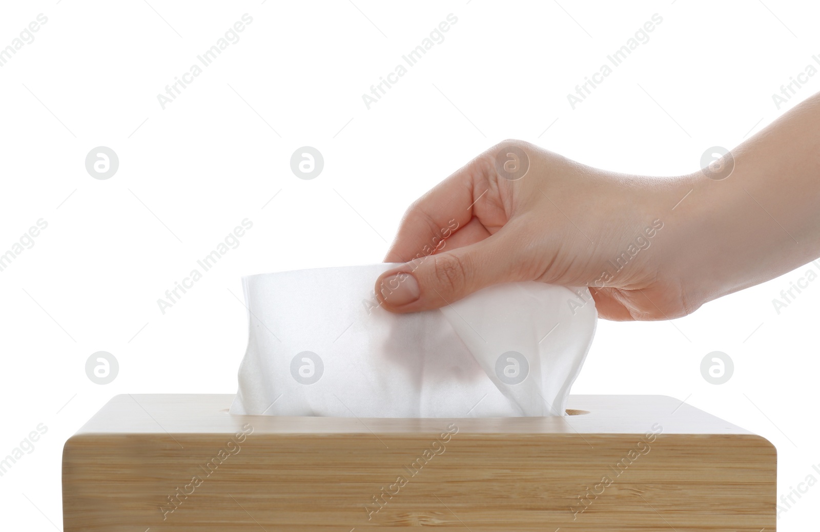 Photo of Woman taking paper tissue from holder on white background, closeup