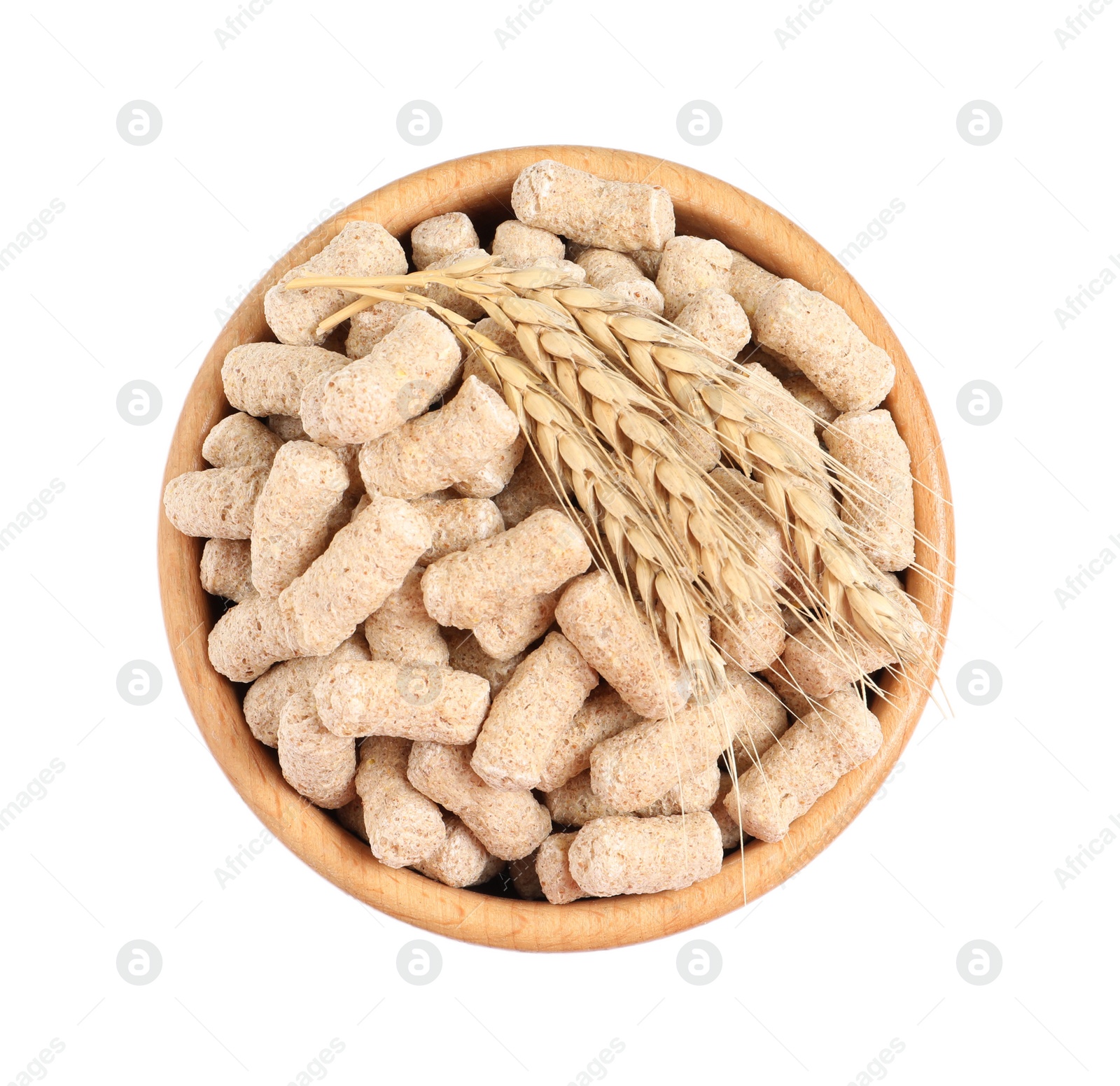 Photo of Granulated wheat bran and spikelets in bowl on white background, top view