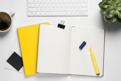 Photo of Flat lay composition with stylish notebooks on white table