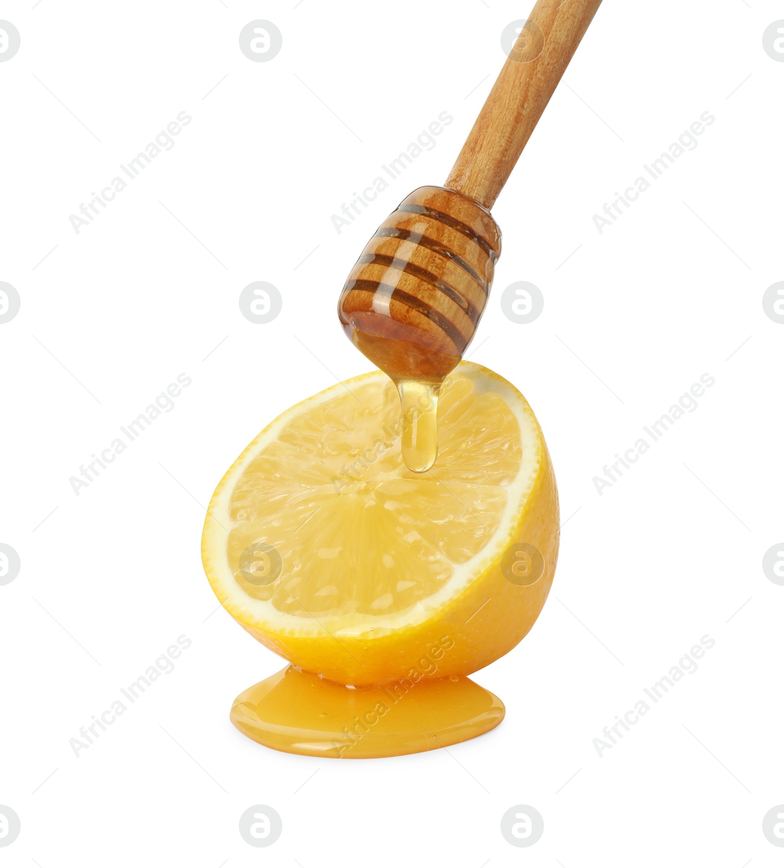 Photo of Dripping sweet honey from dipper onto fresh lemon on white background