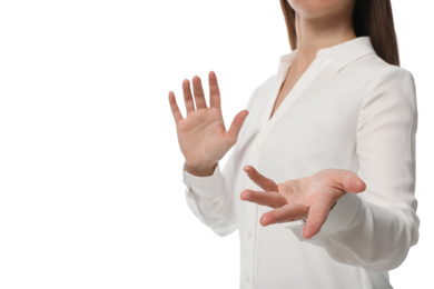 Businesswoman holding something on white background, closeup