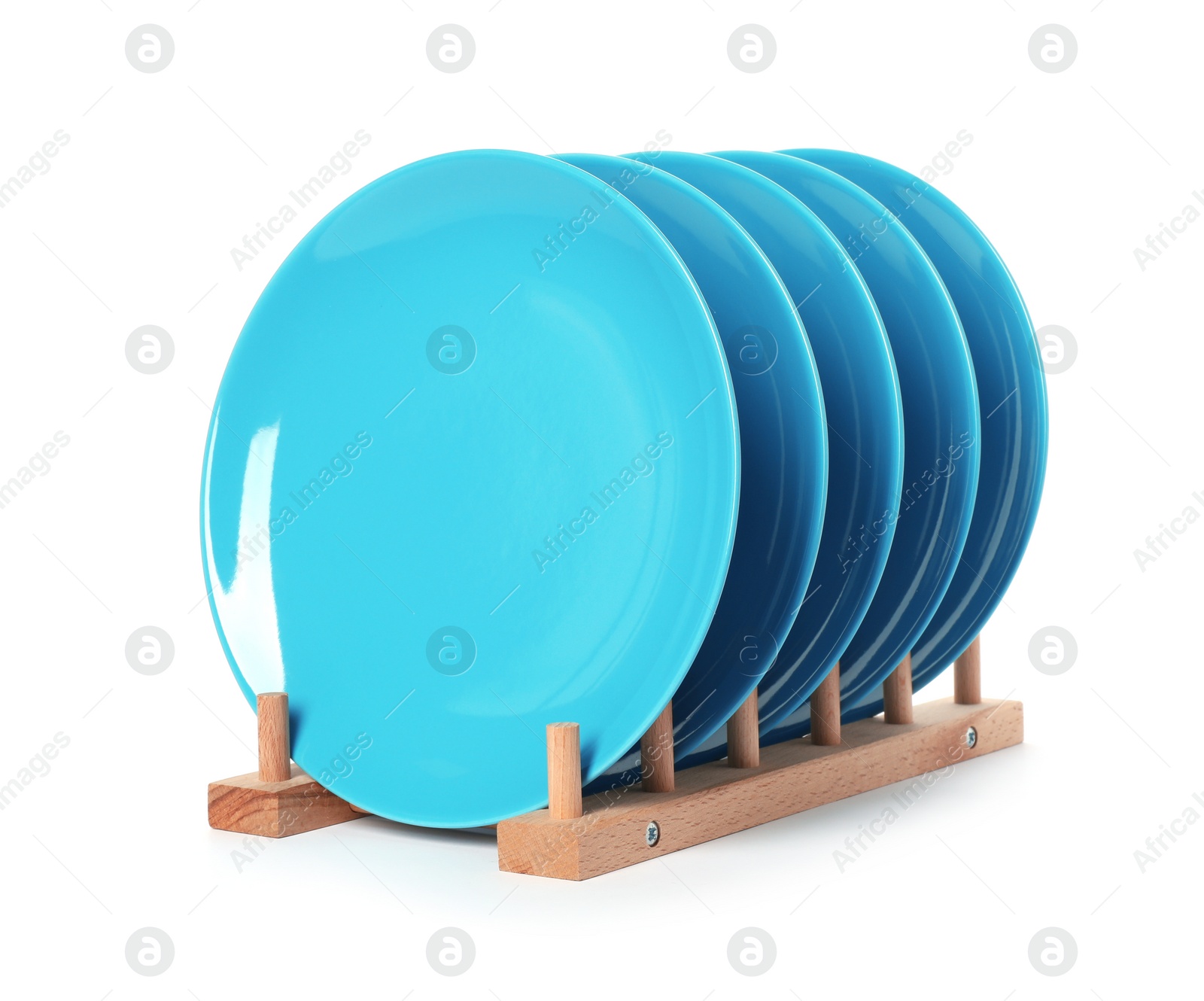 Photo of Rack with clean dishes on white background