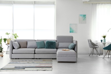 Photo of Modern living room interior with comfortable sofa