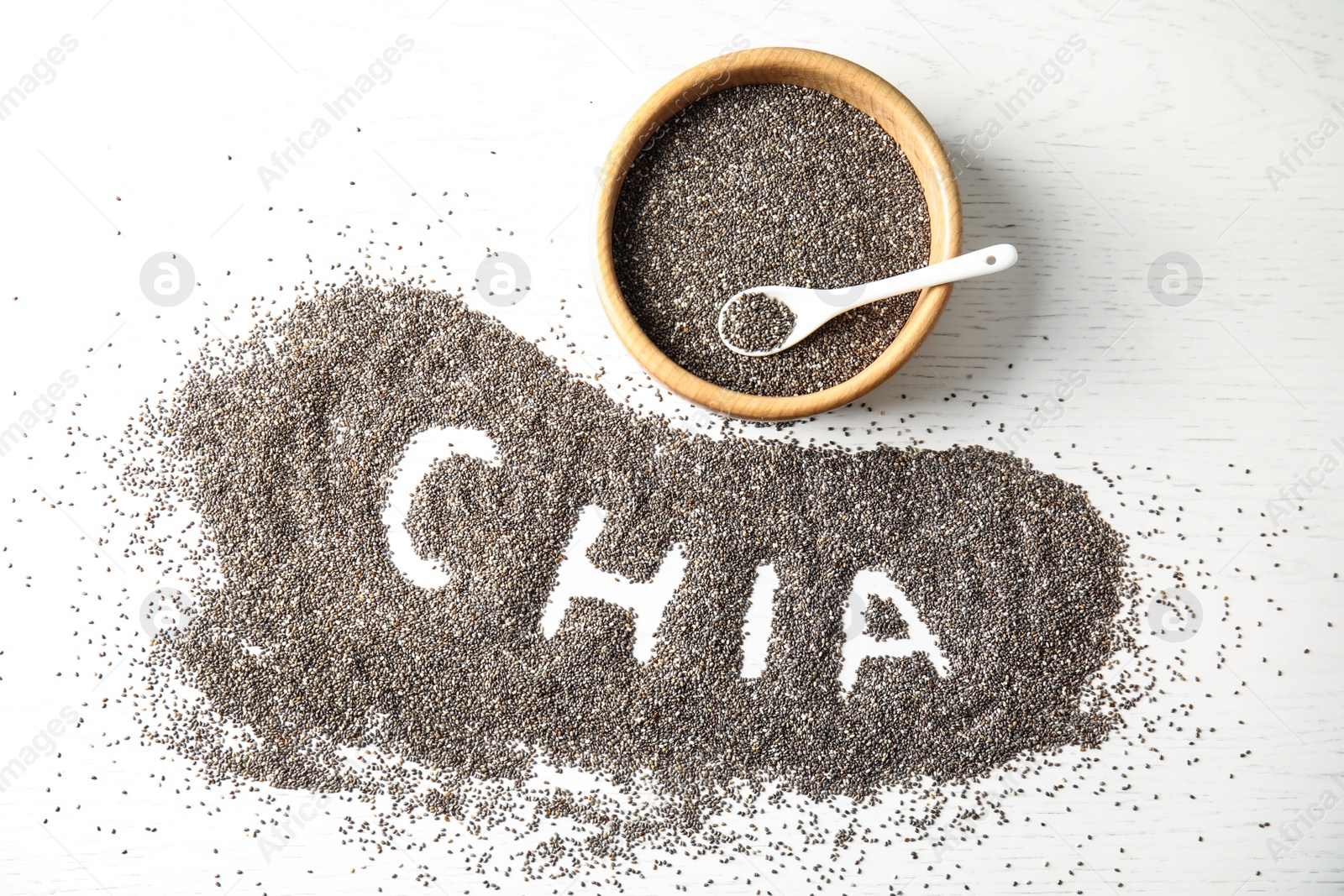 Photo of Flat lay composition with chia seeds on white wooden background