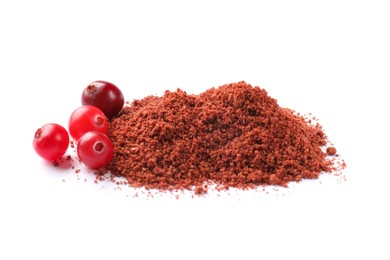 Photo of Dried cranberry powder and fresh berries isolated on white